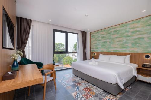 Postel nebo postele na pokoji v ubytování Petro House Vung Tau - Block A