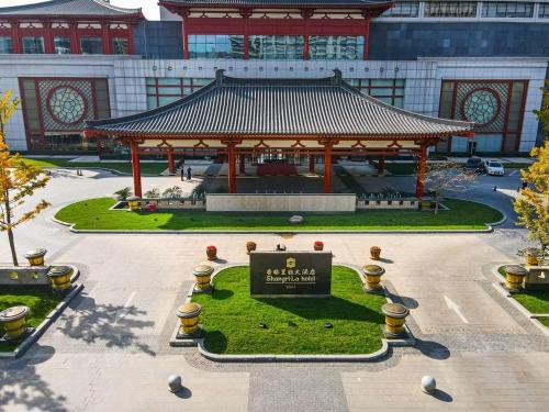 a pavilion with a sign in front of a building at Shangri-La Xian in Xi'an