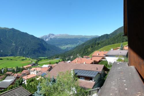 a view of a village in the mountains at Ferienhaus Bensel in Alvaneu
