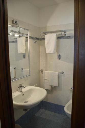 Koupelna v ubytování Hotel Arcobaleno Siena