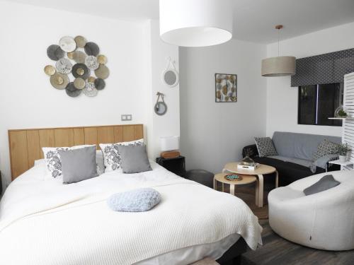 Posteľ alebo postele v izbe v ubytovaní La suite Volupté - SPA du Souffle du Saule
