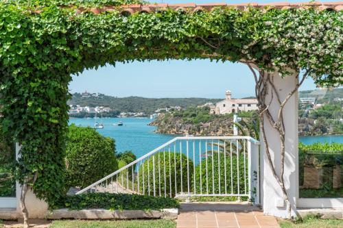 an archway with a view of a body of water at Seth Agamenon in Es Castell