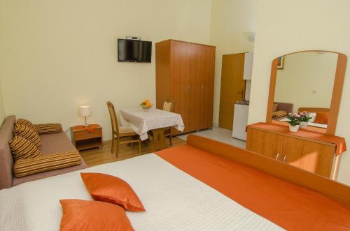 Ένα ή περισσότερα κρεβάτια σε δωμάτιο στο Bed & Breakfast Villa Vrgorac
