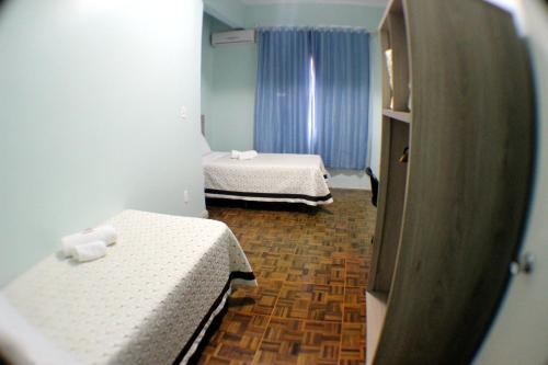 Katil atau katil-katil dalam bilik di Hotel Condá