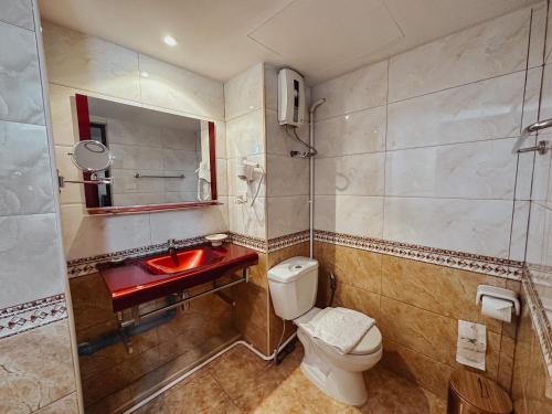 Ένα μπάνιο στο Hotel De Khuvieng
