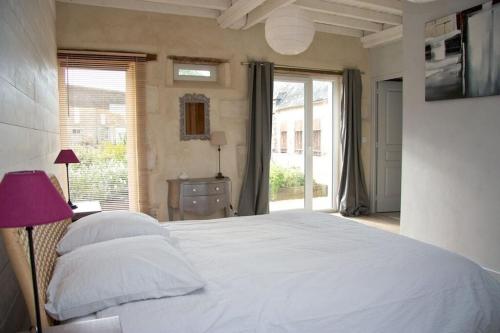 Postel nebo postele na pokoji v ubytování Maison Bel'Air Bayeux