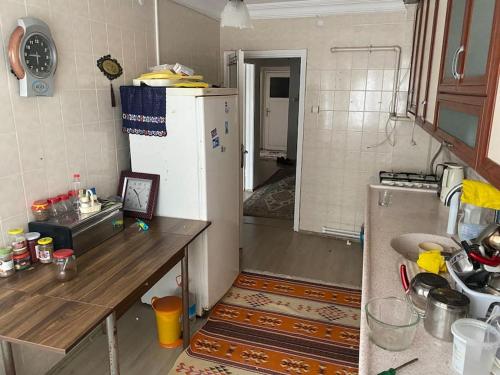 Kuchyň nebo kuchyňský kout v ubytování Apartmen in Mudanya