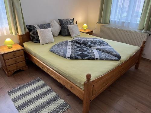 Ein Bett oder Betten in einem Zimmer der Unterkunft Márkói Vendégház