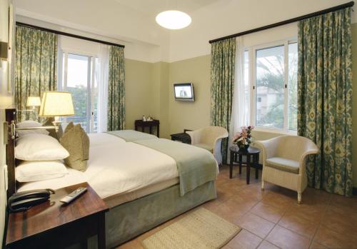Postel nebo postele na pokoji v ubytování Hotel Cardoso