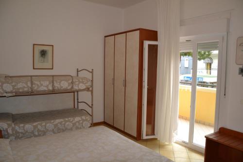 Postel nebo postele na pokoji v ubytování Hotel Ariston