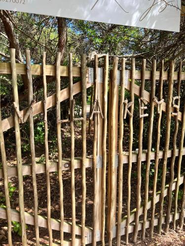 a wooden fence with crosses on it at Villa Keys in Wilderness