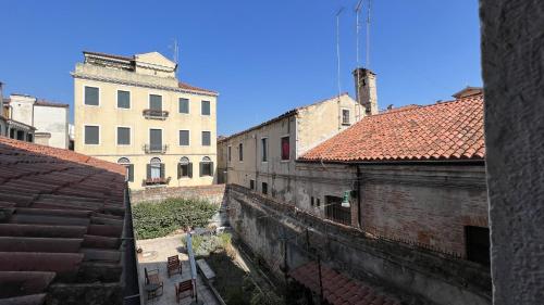 an overhead view of an old city with buildings at Residence Stella in Venice