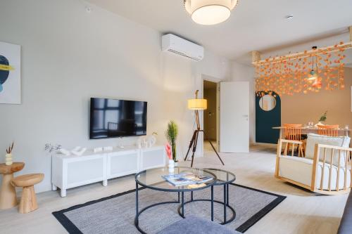 TV a/nebo společenská místnost v ubytování NewInn Hotel Apartments - Cadde 54 Mall