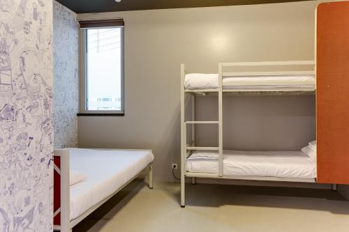 Katil atau katil-katil dalam bilik di ClinkNOORD Hostel