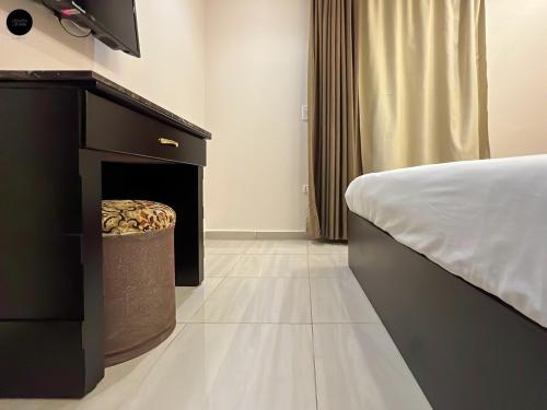 a bedroom with a bed and a fireplace at Giza Pyramids View Inn in Cairo
