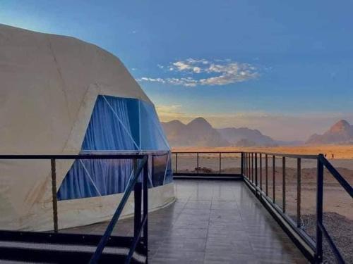a tent with a view of the desert at Salma Desert Camp in Wadi Rum