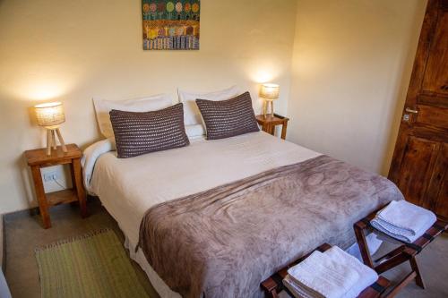 Cama o camas de una habitación en Tinku