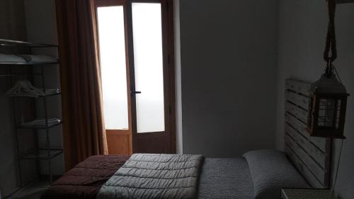 Postel nebo postele na pokoji v ubytování Granada Old Town Hostel