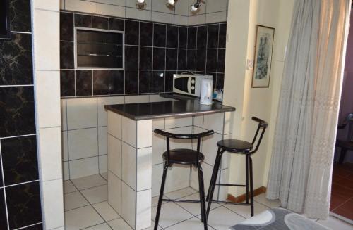 Dapur atau dapur kecil di House Ebony B&B
