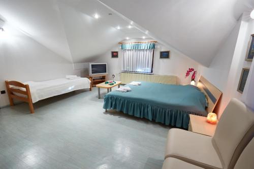Ein Bett oder Betten in einem Zimmer der Unterkunft Apartma Steles