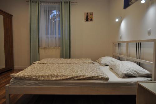 Krevet ili kreveti u jedinici u okviru objekta Apartament u Zięby