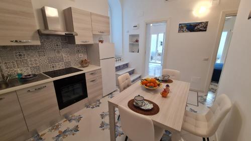 Kuchyň nebo kuchyňský kout v ubytování Casa Piccina