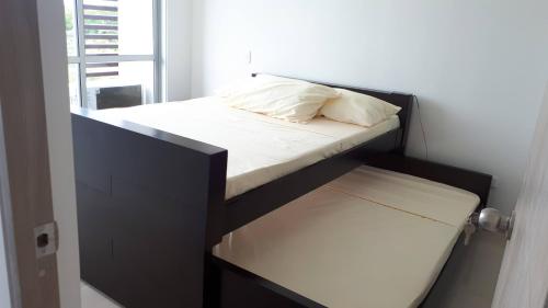 Postel nebo postele na pokoji v ubytování Hermoso apartamento, con la comodidad de tu hogar!