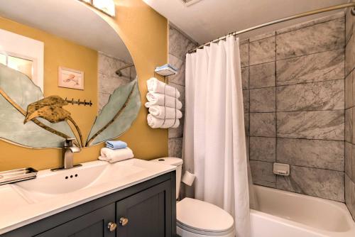 a bathroom with a sink and a shower and a toilet at Daytona Beach Resort Condo 1 Mi to Ocean Center! in Daytona Beach