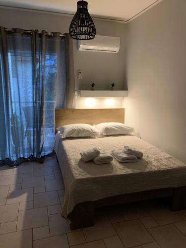 Postel nebo postele na pokoji v ubytování hommie apartment