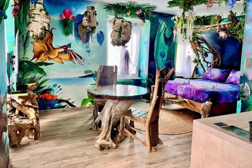 a room with a room with a mermaid mural at Avataar - L'arbre de Pandoraa in Belfort