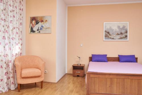 Posteľ alebo postele v izbe v ubytovaní Apartments Lovric with sea view