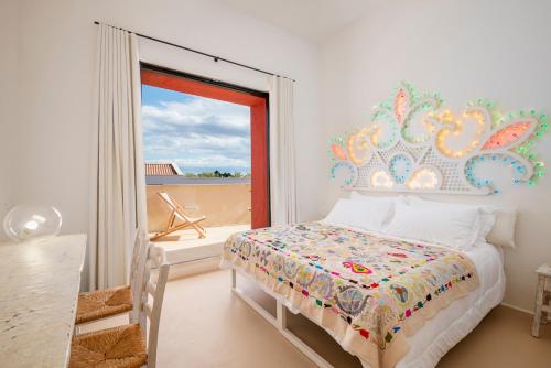 Una cama o camas en una habitación de Estate Oasi Verde Casin Anand