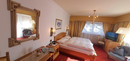 Letto o letti in una camera di Villa Martha Vintage Hotel-B&B