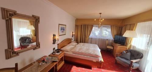 Letto o letti in una camera di Villa Martha Vintage Hotel-B&B