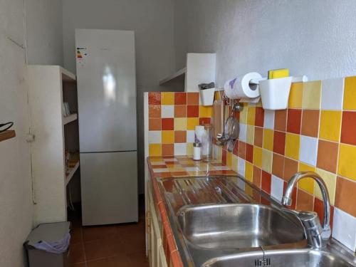 Kuchyňa alebo kuchynka v ubytovaní Casa rural frente al mar La Toscana