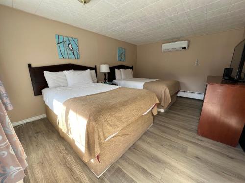 Кровать или кровати в номере Villa Motel