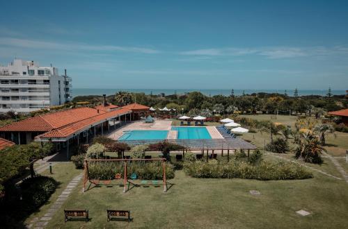 an aerial view of a resort with a swimming pool at Il Belvedere in Punta del Este