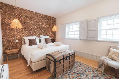 Una cama o camas en una habitación de Quinta de Travassinhos- Douro Valley