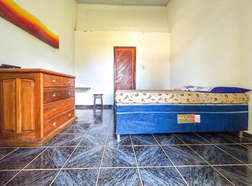 เตียงในห้องที่ Incrivel casa com piscina em Ilheus na Bahia