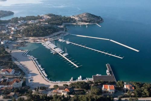 an aerial view of a marina with boats in the water at Oleandra Apartments in Drage