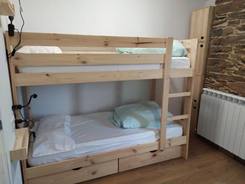Postel nebo postele na pokoji v ubytování Eco dos Teixos