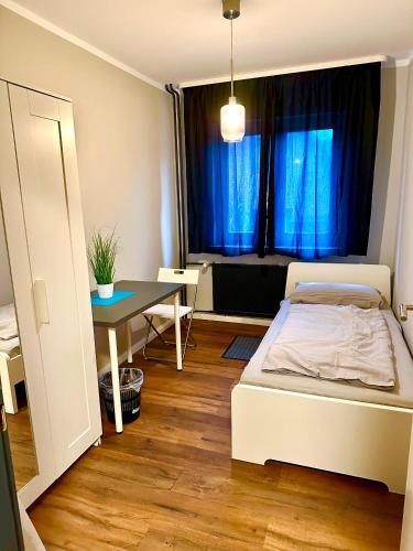 Postel nebo postele na pokoji v ubytování Apartment Hamburg Süd