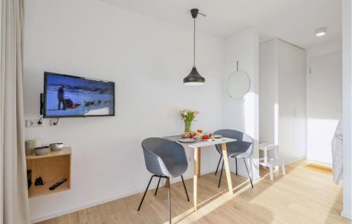 TV a/nebo společenská místnost v ubytování Beach Front Apartment
