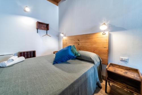 Postel nebo postele na pokoji v ubytování Agriturismo Tenuta del Grillaio