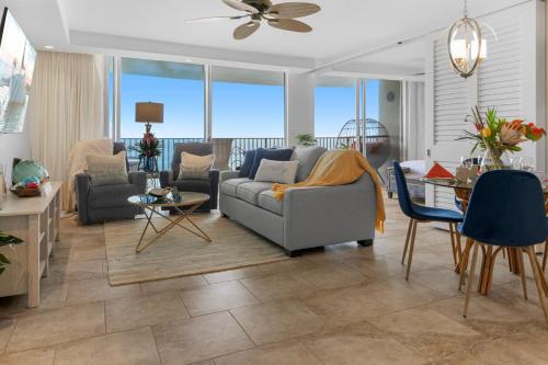 a living room with a couch and a table at Sapphire Oasis- Heavenly Ocean View and Resort in Kahana