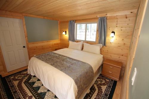 Кровать или кровати в номере Glenogle Mountain Lodge and Spa