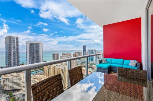 a balcony with a view of the city at Beachwalk Resort - PENTHOUSE IN THE SKY 3BDR and 3BA LUXURY CONDO DIRECT OCEAN VIEW in Hallandale Beach