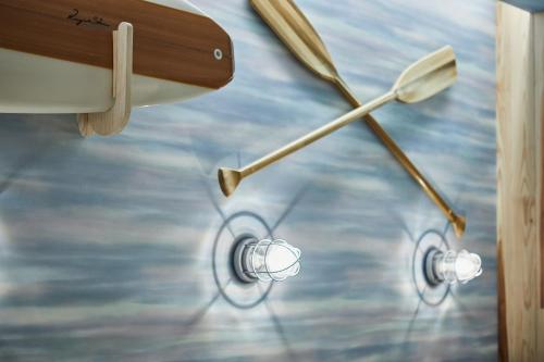 a pair of hockey sticks on a table at Hotel TORACO konohana in Osaka
