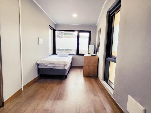 Letto o letti in una camera di J.Hill House