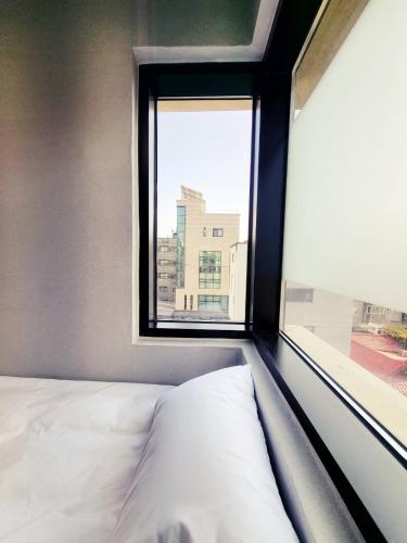 Letto o letti in una camera di J.Hill House